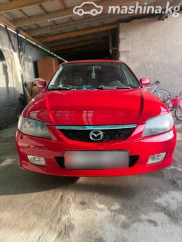 Mazda 323 VI (BJ) Рестайлинг 1.6 MT