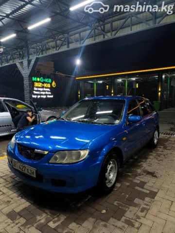 Mazda 323 VI (BJ) Рестайлинг 1.6 MT