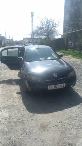 Nissan Almera II (N16) Рестайлинг 1.5 MT