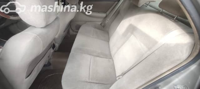 Toyota Corolla IX (E120, E130) 1.5 AT