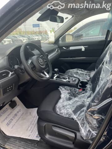 Mazda CX-5 II Рестайлинг 2.0 MT 4WD