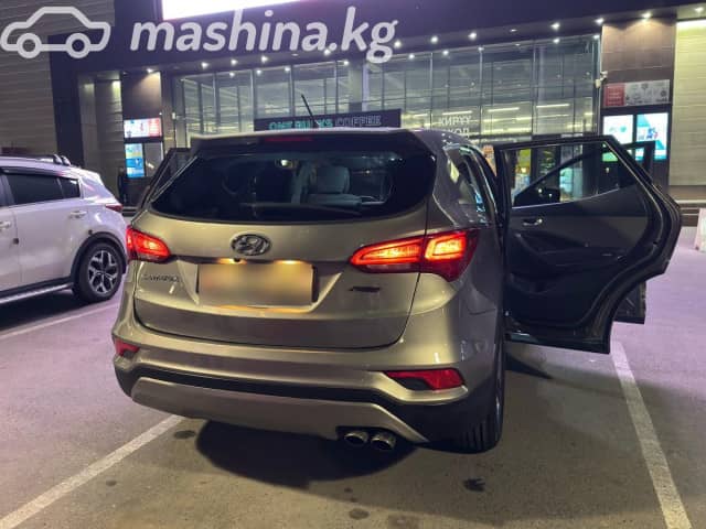 Hyundai Santa Fe III Рестайлинг 2.4 AT