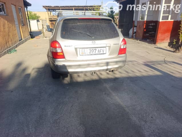 Mazda 323 VI (BJ) Рестайлинг 1.5 MT