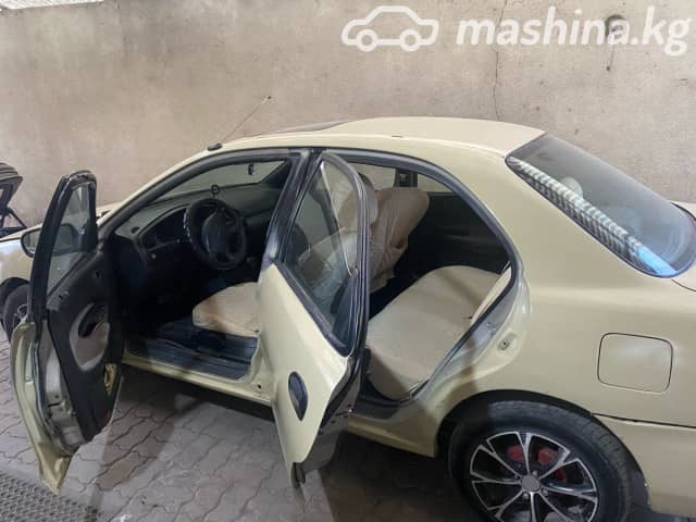 Mazda 323 V (BA) 1.5 AT