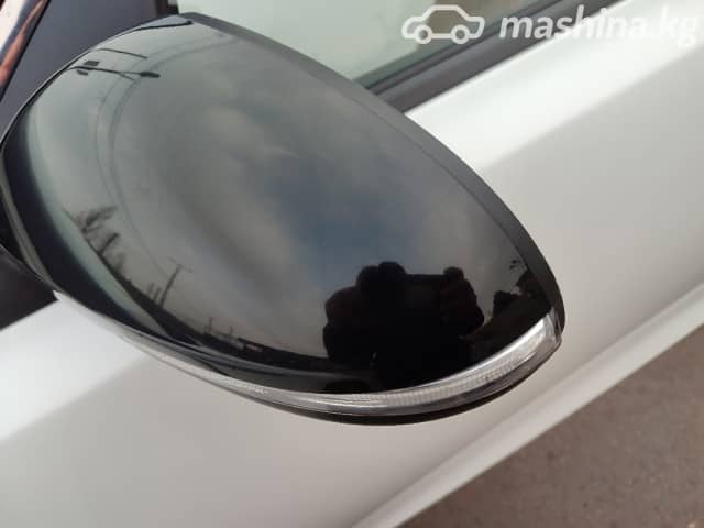 Kia K5 II 2.0 AT