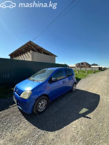 Daihatsu Cuore VI (L251) 1.0 MT