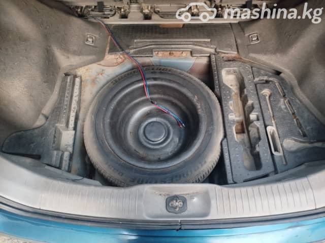 Nissan Almera Tino 1.8 MT