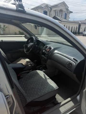 Mazda 323 VI (BJ) Рестайлинг 1.6 MT