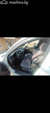 Kia K5 II 2.0 AT