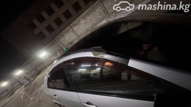 Nissan Primera III (P12) 1.8 MT