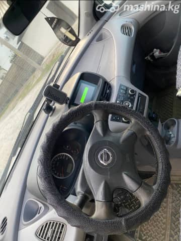 Nissan Almera Tino 1.8 MT