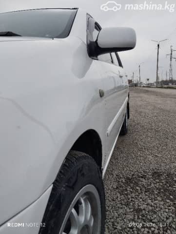 Toyota Corolla IX (E120, E130) 1.6 MT