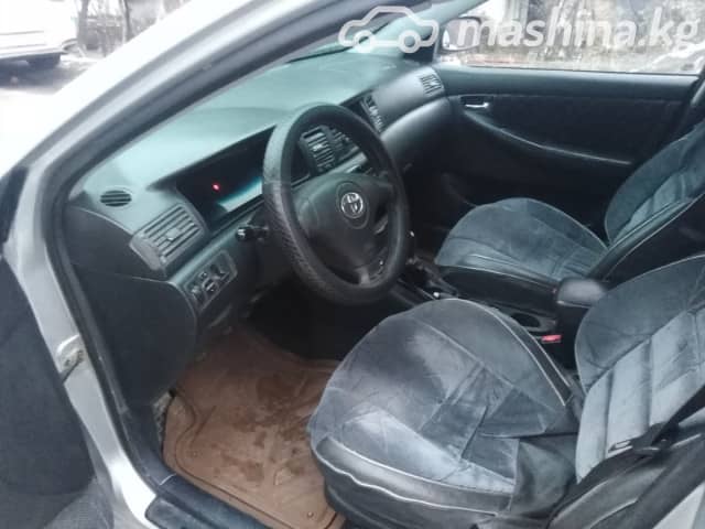 Toyota Corolla IX (E120, E130) 1.6 MT