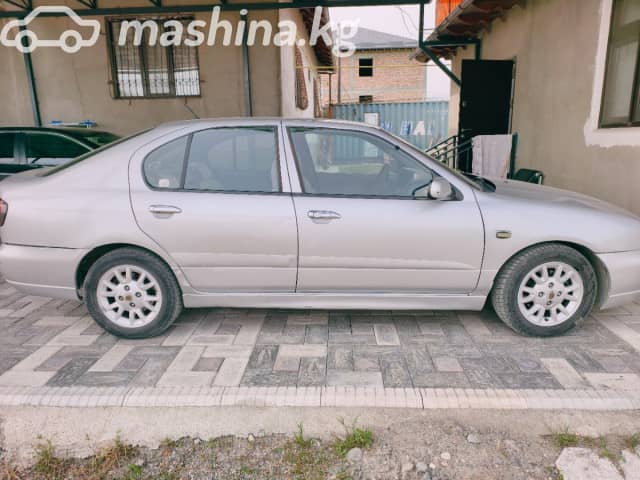 Nissan Primera II (P11) Рестайлинг 1.8 MT