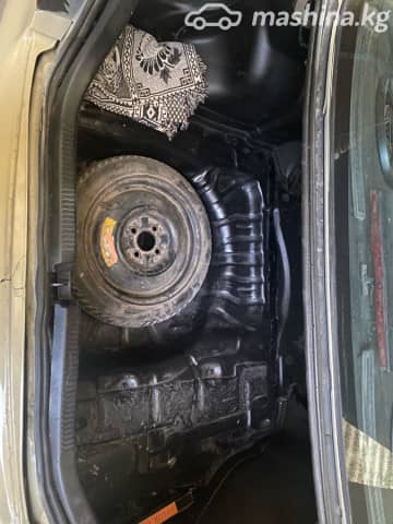 Mazda 323 V (BA) 1.5 AT