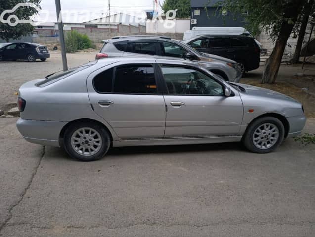 Nissan Primera II (P11) Рестайлинг 1.8 MT