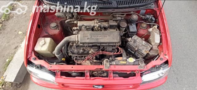 Daihatsu Cuore IV (L500) 0.9 MT