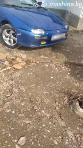 Mazda 323 V (BA) 1.5 MT