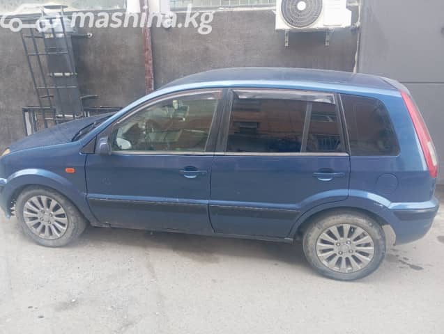Ford Fusion I Рестайлинг 1.6 MT