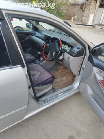 Toyota Corolla IX (E120, E130) 1.5 AT