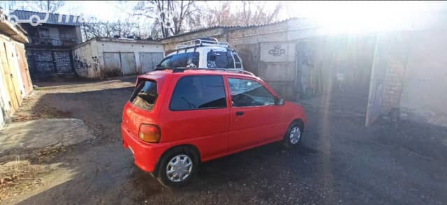 Daihatsu Cuore IV (L500) 0.9 MT