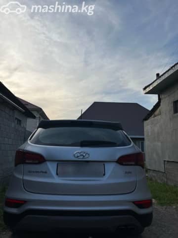 Hyundai Santa Fe III Рестайлинг 2.0d AT