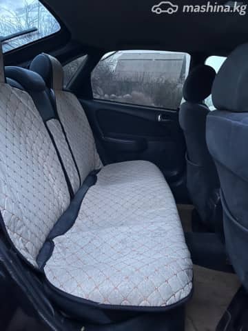 Toyota Corolla VIII (E110) Рестайлинг 1.6 AT