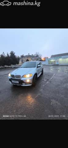 BMW X5 II (E70) 48i 4.8 AT 4WD