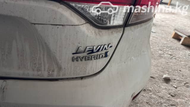 Toyota Corolla XI (E160, E170) Рестайлинг 2 Axio 1.5hyb CVT
