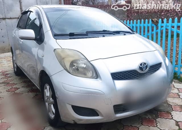 Toyota Yaris II Рестайлинг 1.0 MT
