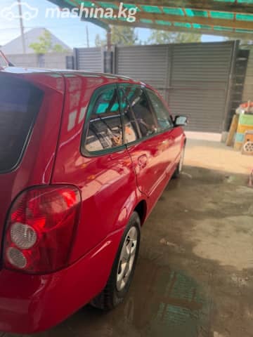 Mazda 323 VI (BJ) Рестайлинг 1.6 MT