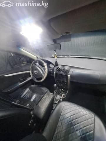 Nissan Almera III (G15) 1.6 MT