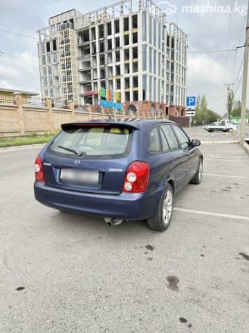 Mazda 323 VI (BJ) Рестайлинг 1.6 MT