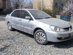 Mitsubishi Lancer IX Рестайлинг 1.6 MT