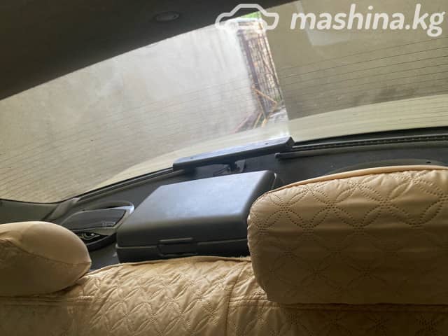 Mazda 323 V (BA) 1.5 AT