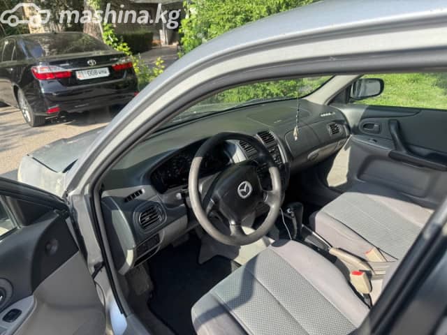 Mazda 323 VI (BJ) Рестайлинг 1.6 AT