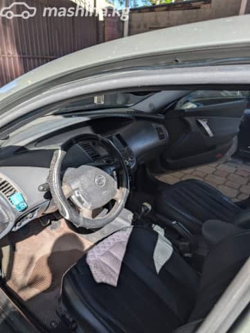 Nissan Primera III (P12) 1.8 MT