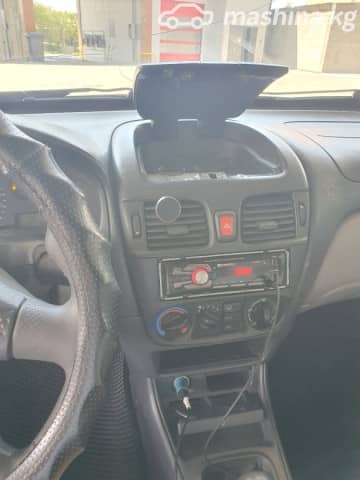 Nissan Almera II (N16) 1.8 MT
