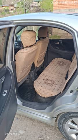 Suzuki Liana I Рестайлинг 1.6 MT 4WD