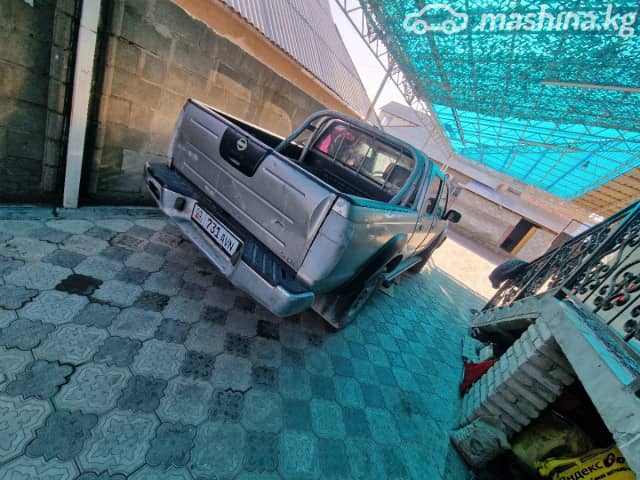 Nissan Navara (Frontier) II (D22) 2.5d MT 4WD