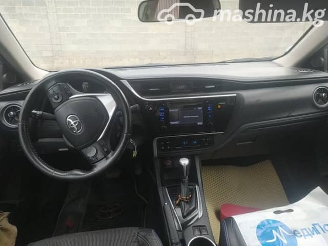 Toyota Corolla XI (E160, E170) Рестайлинг 2 Axio 1.5 CVT