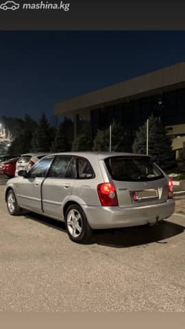 Mazda 323 VI (BJ) Рестайлинг 1.6 MT