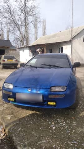 Mazda 323 V (BA) 1.5 MT