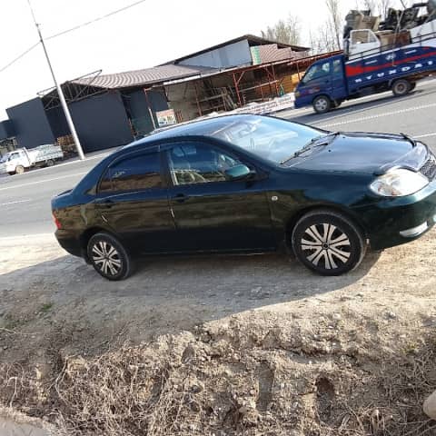 Toyota Corolla IX (E120, E130) 1.6 MT
