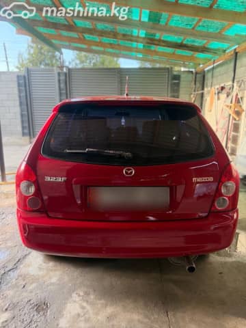 Mazda 323 VI (BJ) Рестайлинг 1.6 MT