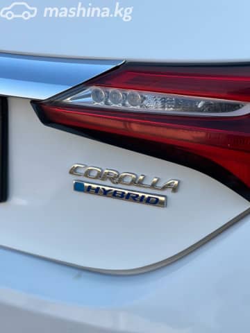 Toyota Corolla XI (E160, E170, E180) Рестайлинг 1 Axio 1.5hyb CVT