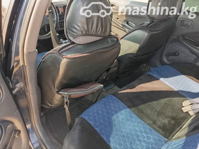 Nissan Almera II (N16) Рестайлинг 1.8 AT