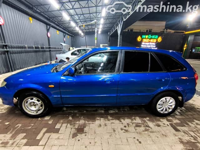Mazda 323 VI (BJ) Рестайлинг 1.6 MT