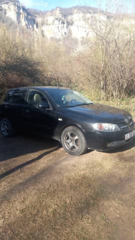 Nissan Almera II (N16) Рестайлинг 1.5 MT