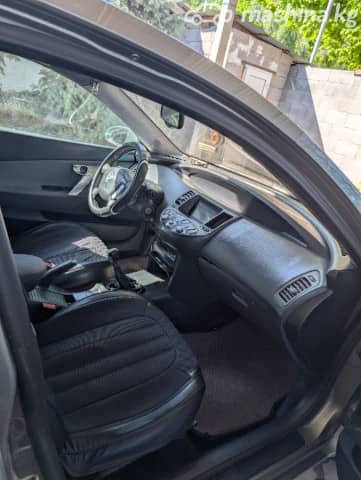 Nissan Primera III (P12) 1.8 MT